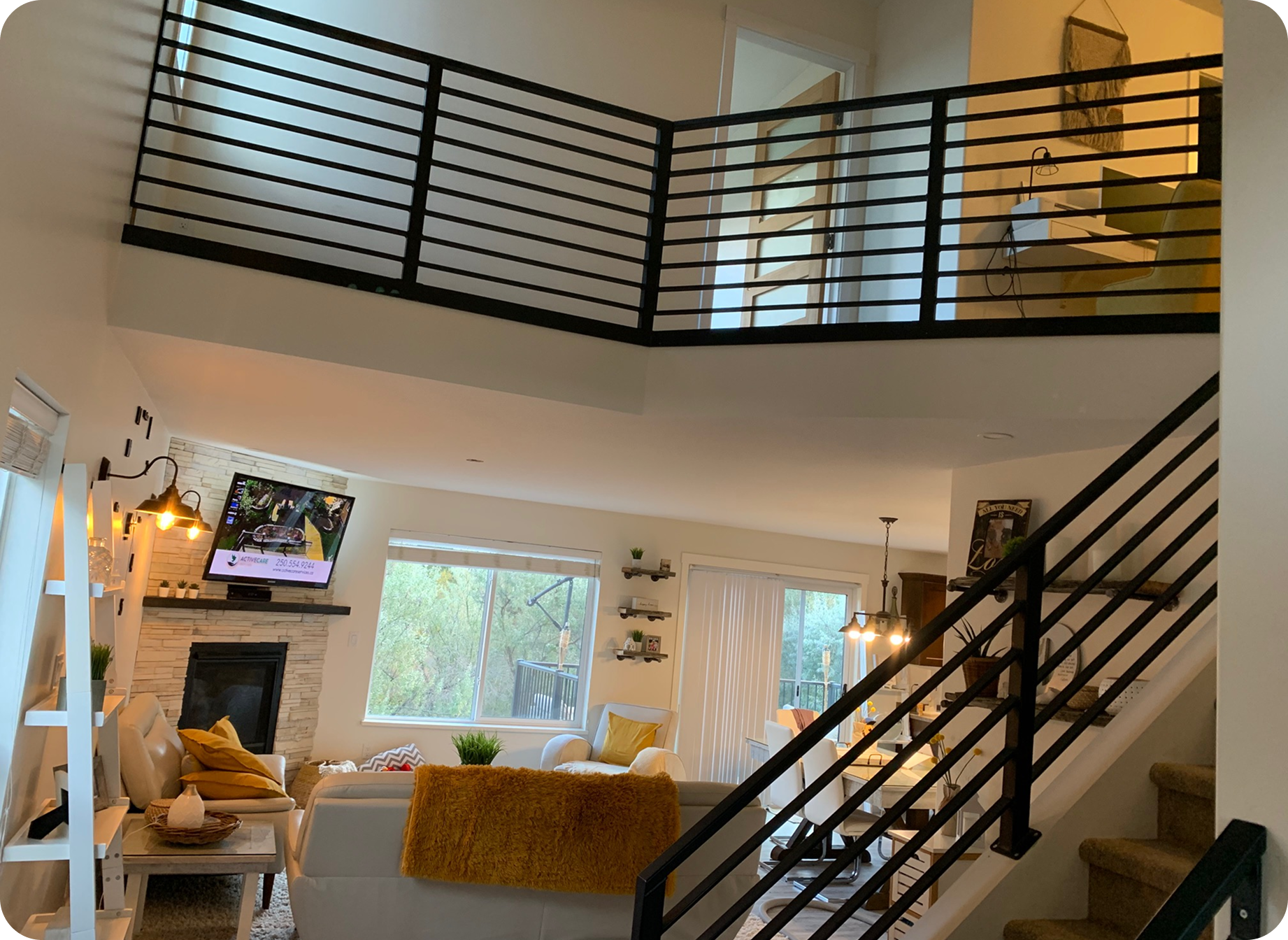 Interior steel staircase and railing installed in a Kamloops home